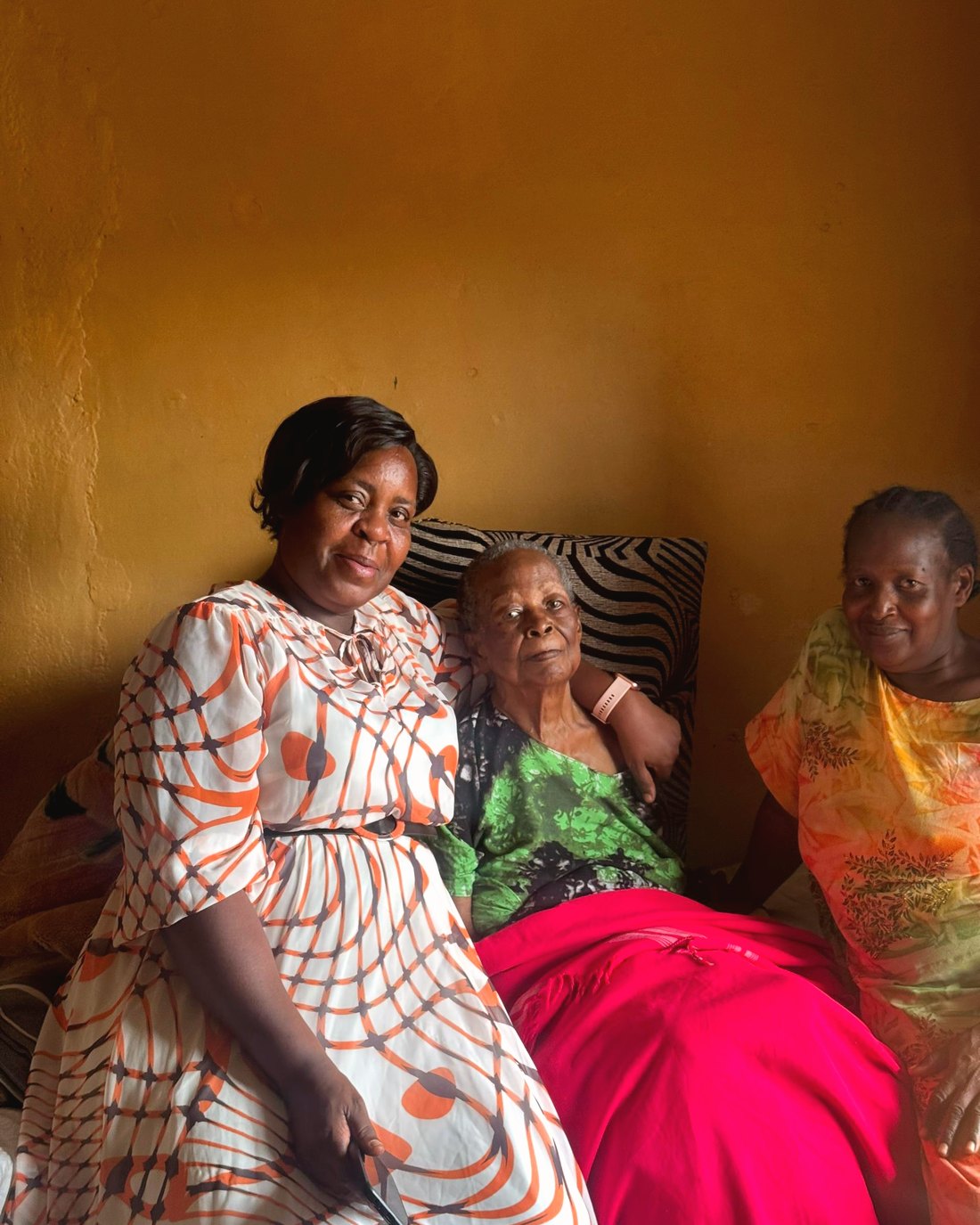 Members visiting an elder at home